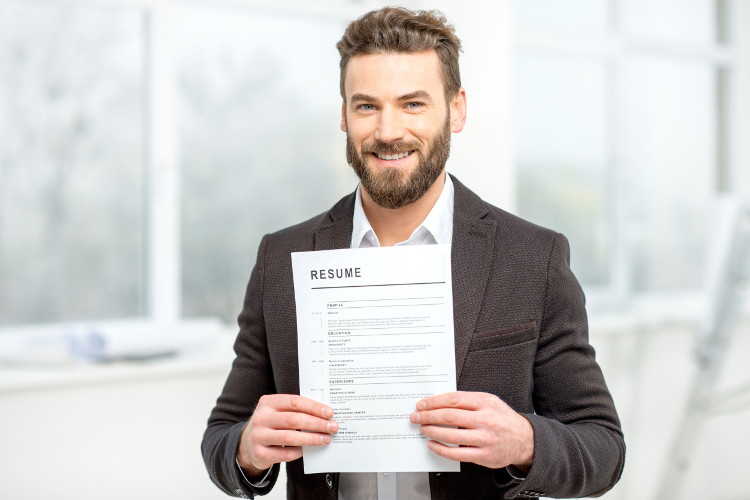 Job seeker holding resume